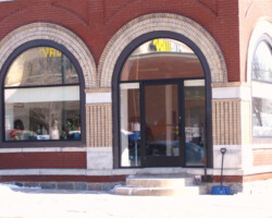 This is an example of a building being restored back to the original sized openings from the 1800′s