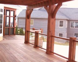 Some customers prefer the wood look with their glass railing. This looks very nice, it's also an inexpensive option. Some customers prefer the wood look with their glass railing. This looks very nice, it's also an inexpensive option.