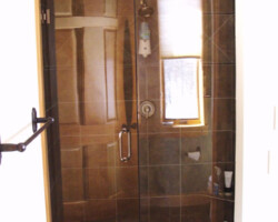 Do You have a unique design for a shower, let us make it a reality. This shower is 1/2" clear tempered inverted curve European style pivot with panel