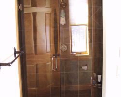 Do You have a unique design for a shower, let us make it a reality. This shower is 1/2" clear tempered inverted curve European style pivot with panel Do You have a unique design for a shower, let us make it a reality. This shower is 1/2" clear tempered inverted curve European style pivot with panel